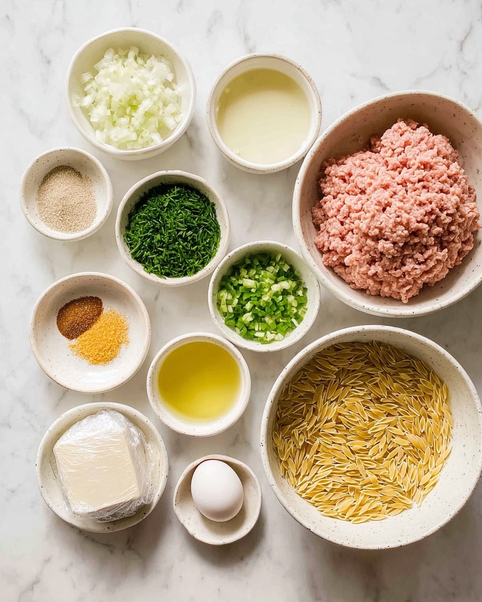 The image shows a white marbled background with several white speckled bowls and small cups arranged neatly. On the right is a large bowl filled with light pink ground meat. Below it, a similar large bowl holds dry orzo pasta with a yellowish color. To the left of these bowls, there are smaller bowls arranged in groups: one with finely chopped white onions, one with chopped green herbs, one with chopped green scallions, one with yellow grated zest, and one with a round piece of white cheese wrapped in foil. There is also a white bowl with white and orange granulated spices, a small cup with light oil, a small cup with a yellow liquid, and a clear cup with light yellow broth or stock. In the middle, there is a single white egg placed beside the chopped herbs. Everything is spread evenly and clearly visible. Photo taken with an iphone --ar 4:5 --v 7